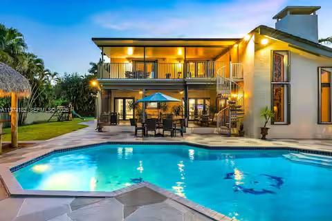 6140 Southwest 56th Court Davie, FL 33314 - Photo 4 of 69 When your backyard looks like a five-star getaway and even the pool’s posing for sunset selfies!