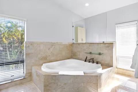 6140 Southwest 56th Court Davie, FL 33314 - Photo 46 of 69 Spa-style soaking tub with garden window views!