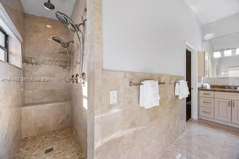 6140 Southwest 56th Court Davie, FL 33314 - Photo 48 of 69 Walk-through shower with travertine tile luxury!