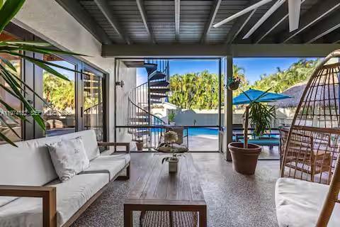 6140 Southwest 56th Court Davie, FL 33314 - Photo 49 of 69 Industrial-chic covered patio with pool views!