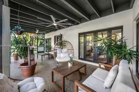 6140 Southwest 56th Court Davie, FL 33314 - Photo 51 of 69 Covered outdoor living with hanging bubble chair!