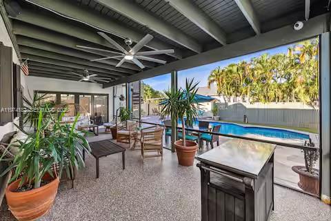 6140 Southwest 56th Court Davie, FL 33314 - Photo 52 of 69 Poolside patio paradise with terrazzo floors!