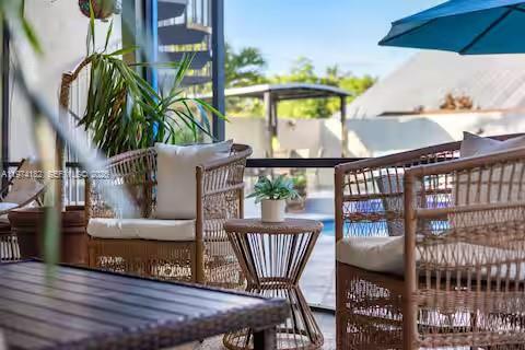 6140 Southwest 56th Court Davie, FL 33314 - Photo 60 of 69 Rattan outdoor furniture creates tropical deck vibes!