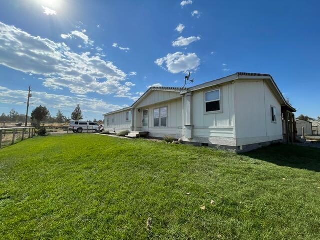 15295 Southwest Twin Lakes Ranch Road Powell Butte, OR 97753 - Photo 1 of 21 Abell front of house