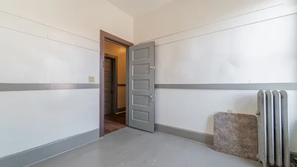 a utility room with sink dryer and washer
