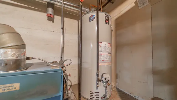 a view of livingroom with furniture and window
