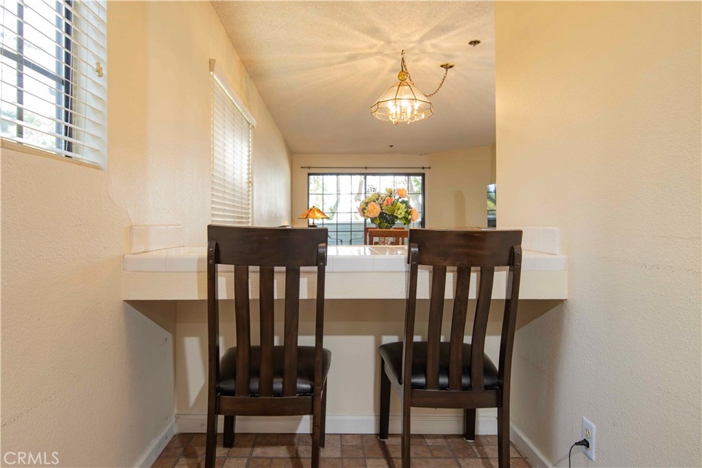 6545 Reseda Boulevard, Unit 8 Reseda, CA 91335 - Photo 9 of 24 a view of a dining room with furniture and window