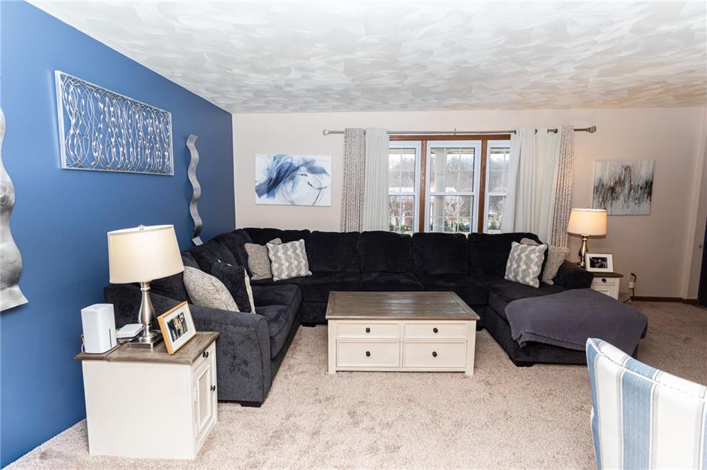 57 Russ Street Uniontown, PA 15401 - Photo 13 of 40 a living room with furniture and a large window