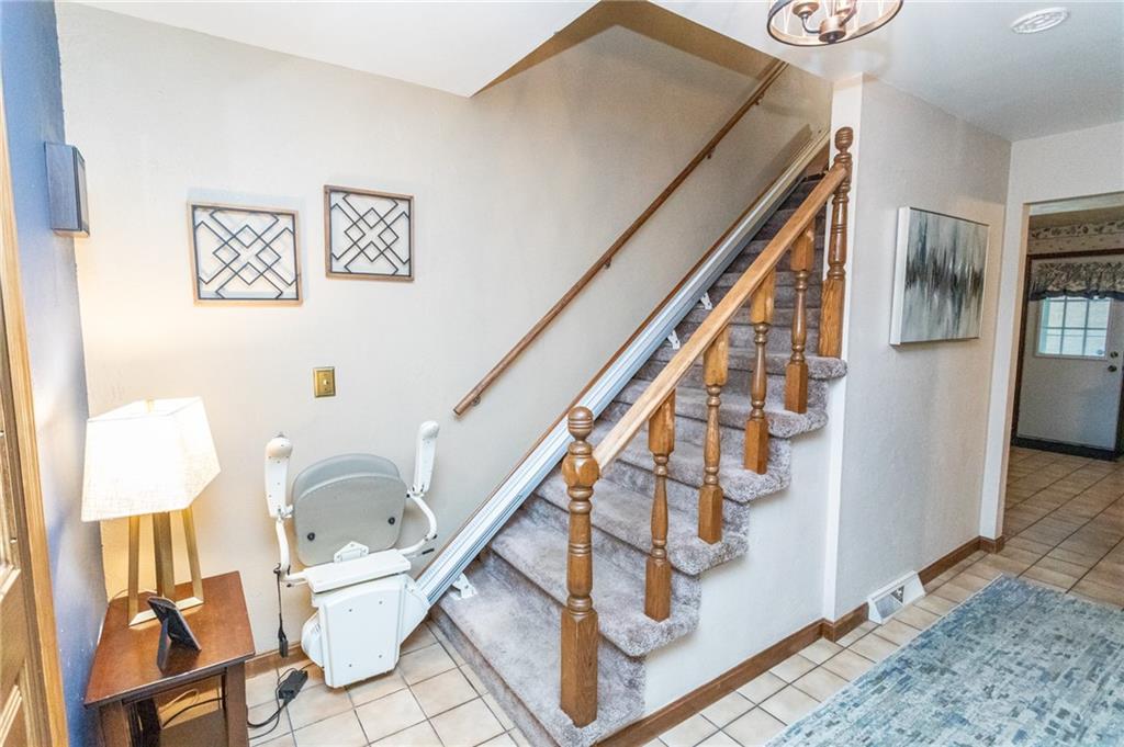 57 Russ Street Uniontown, PA 15401 - Photo 27 of 40 a view of entryway livingroom and hall with wooden floor