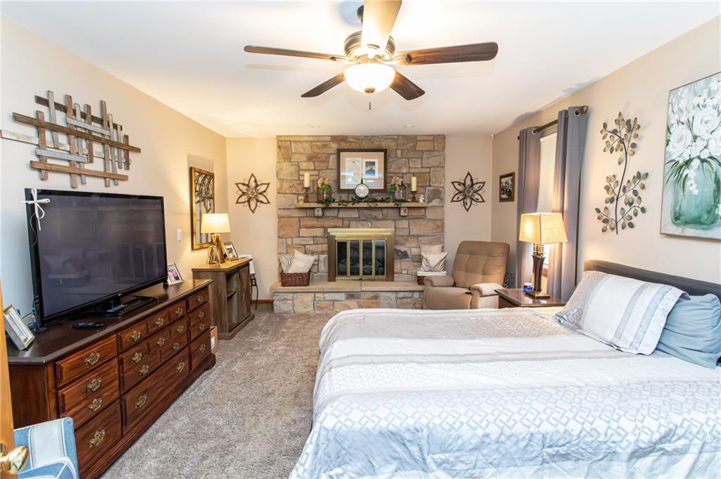 57 Russ Street Uniontown, PA 15401 - Photo 30 of 40 a living room with furniture and a flat screen tv