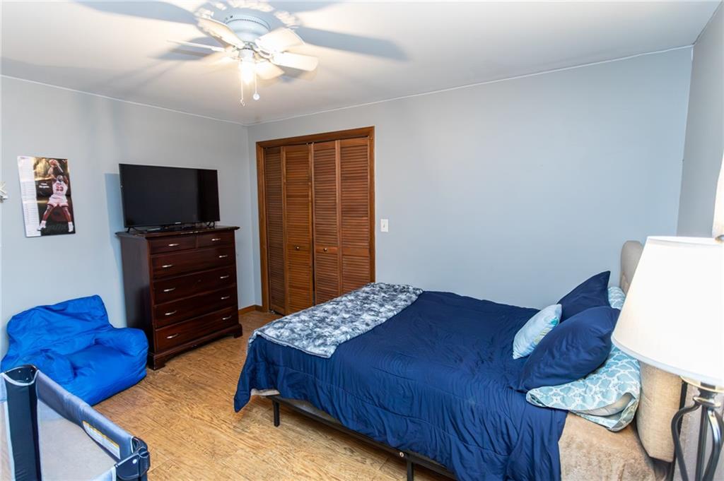 57 Russ Street Uniontown, PA 15401 - Photo 33 of 40 a bedroom with a bed and a television