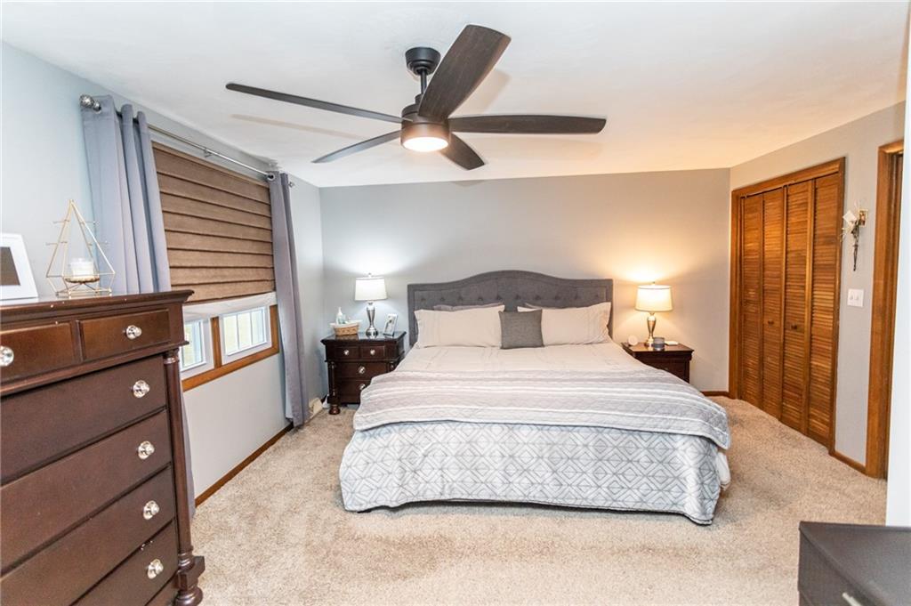 57 Russ Street Uniontown, PA 15401 - Photo 35 of 40 a bedroom with a large bed and a window