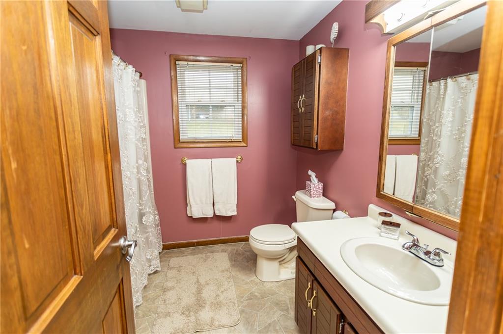 57 Russ Street Uniontown, PA 15401 - Photo 36 of 40 a bathroom with a sink toilet and shower