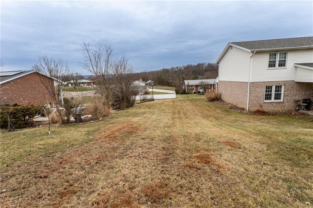 57 Russ Street Uniontown, PA 15401 - Photo 6 of 40 a view of a house with a yard