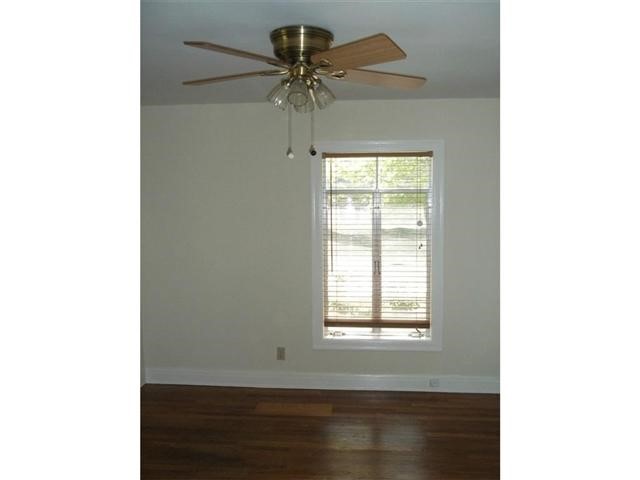 2511 Enfield Road, Unit A Austin, TX 78703 - Photo 5 of 5 a view of an empty room with a window