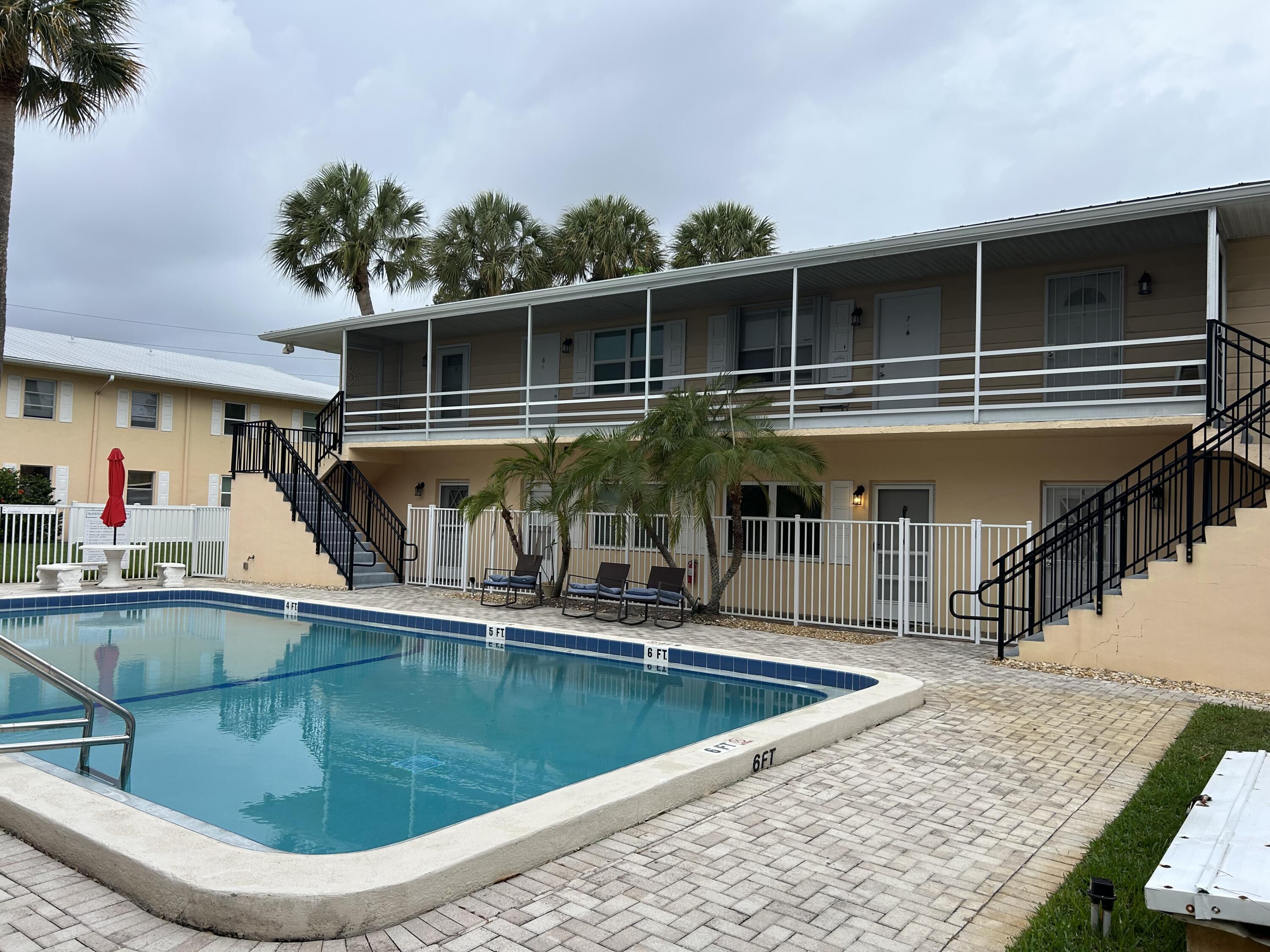 333 Southeast Martin Avenue, Unit 47 Stuart, FL 34996 - Photo 1 of 11 a view of a house with pool