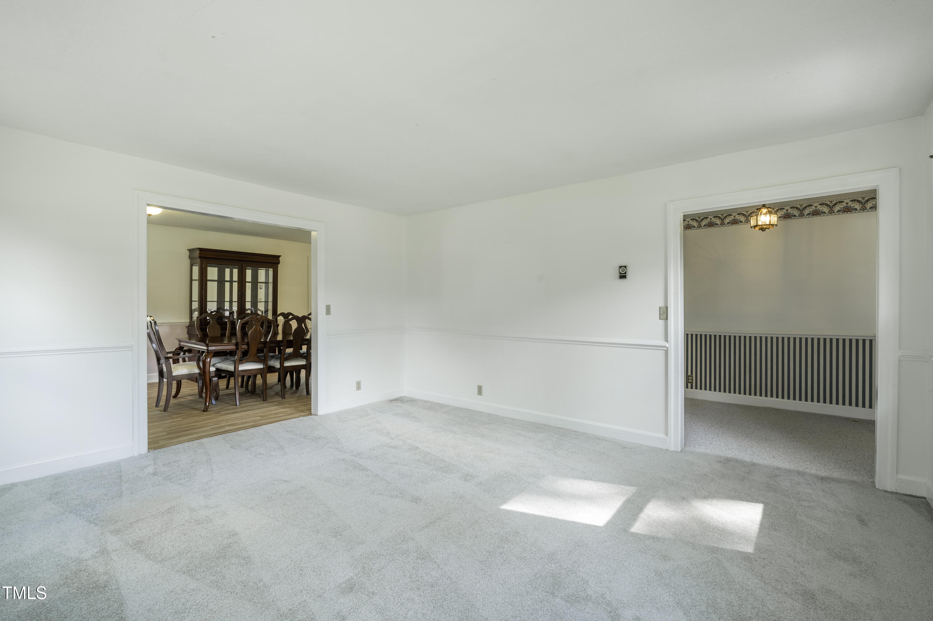 1604 Brunswick Drive Dunn, NC 28334 - Photo 19 of 43 an empty room with furniture and a window