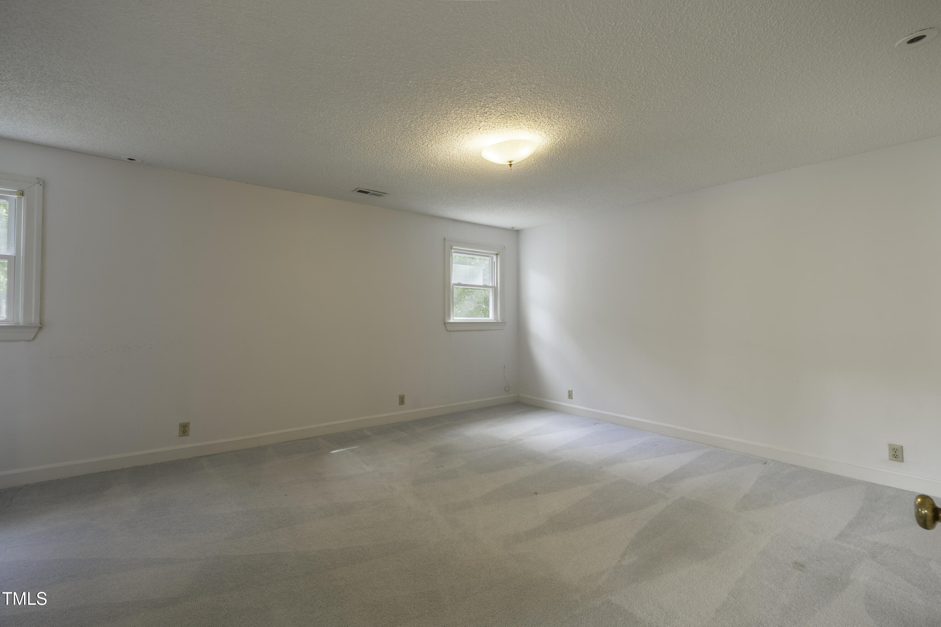 1604 Brunswick Drive Dunn, NC 28334 - Photo 25 of 43 an empty room with a window