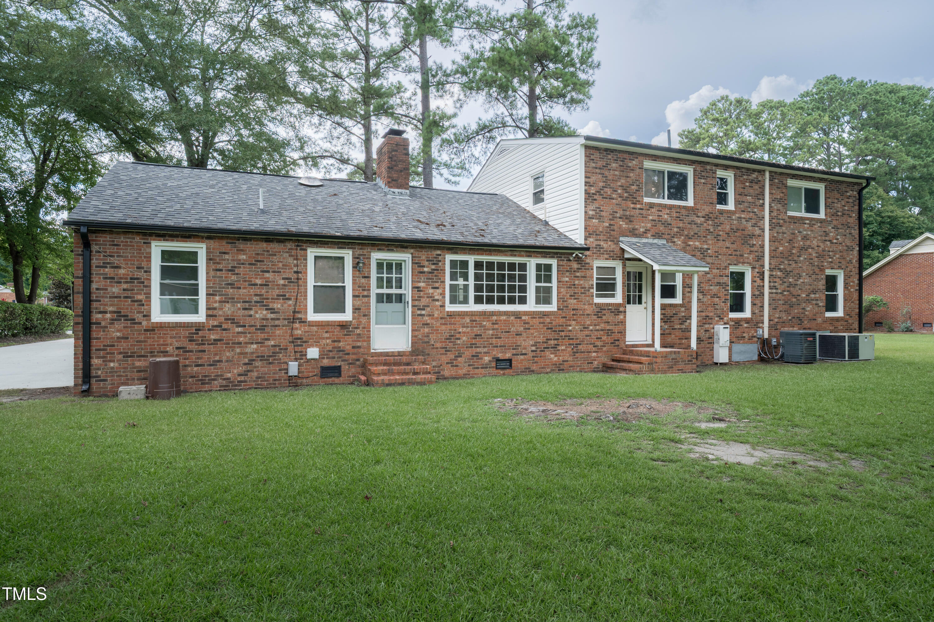 1604 Brunswick Drive Dunn, NC 28334 - Photo 33 of 43 a front view of a house with a yard