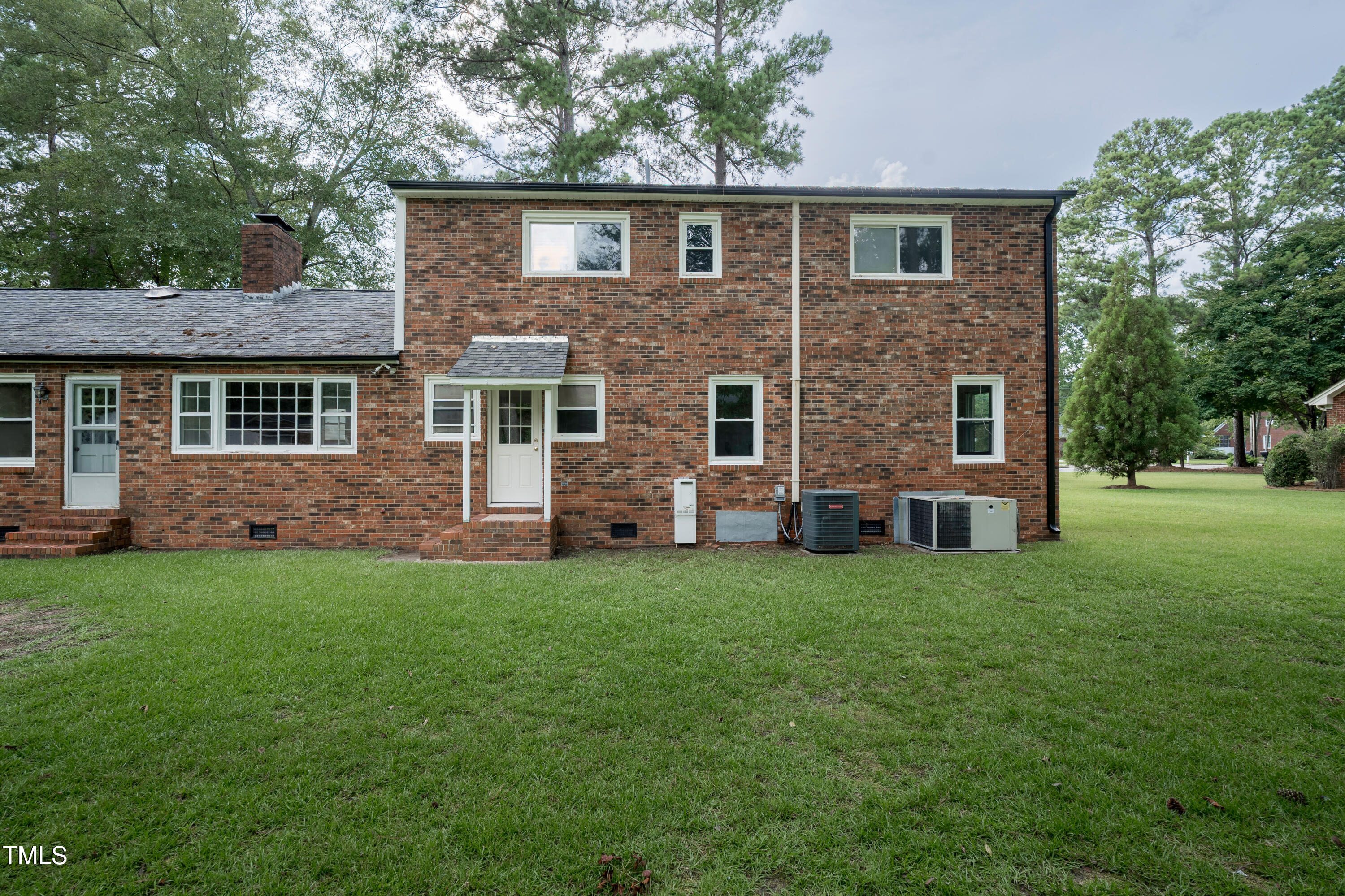 1604 Brunswick Drive Dunn, NC 28334 - Photo 34 of 43 a front view of a house with a yard