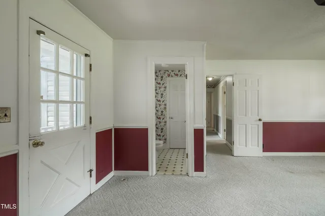 a view of an empty room with window