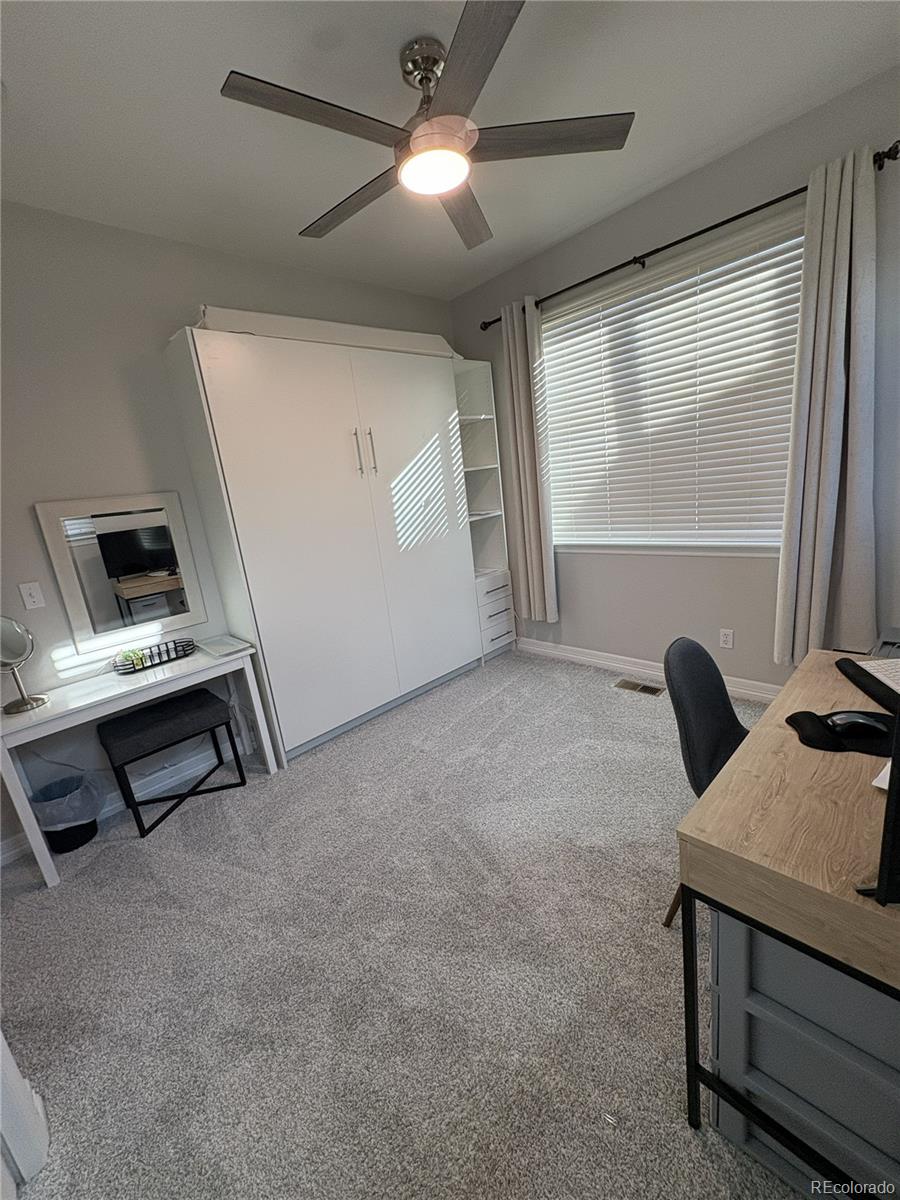 10158 RidgeGate Circle Lone Tree, CO 80124 - Photo 10 of 15 a view of workspace with furniture and window