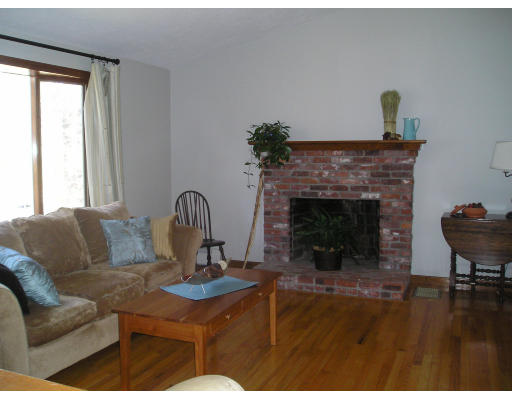 20 Pikes Hill Road Sterling, MA 01564 - Photo 3 of 16 a living room with furniture and a fireplace
