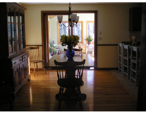 20 Pikes Hill Road Sterling, MA 01564 - Photo 4 of 16 a dining room with furniture a chandelier and wooden floor