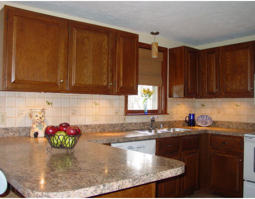 20 Pikes Hill Road Sterling, MA 01564 - Photo 6 of 16 a kitchen with sink a window and cabinets