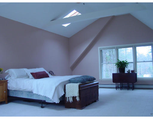 20 Pikes Hill Road Sterling, MA 01564 - Photo 9 of 16 a bedroom with furniture and a potted plant