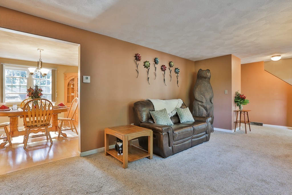 20 Patten Road Tewksbury, MA 01876 - Photo 14 of 29 a living room with furniture and a table