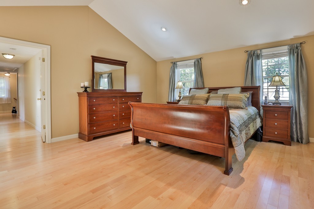 20 Patten Road Tewksbury, MA 01876 - Photo 18 of 29 a bedroom with a bed and a dresser