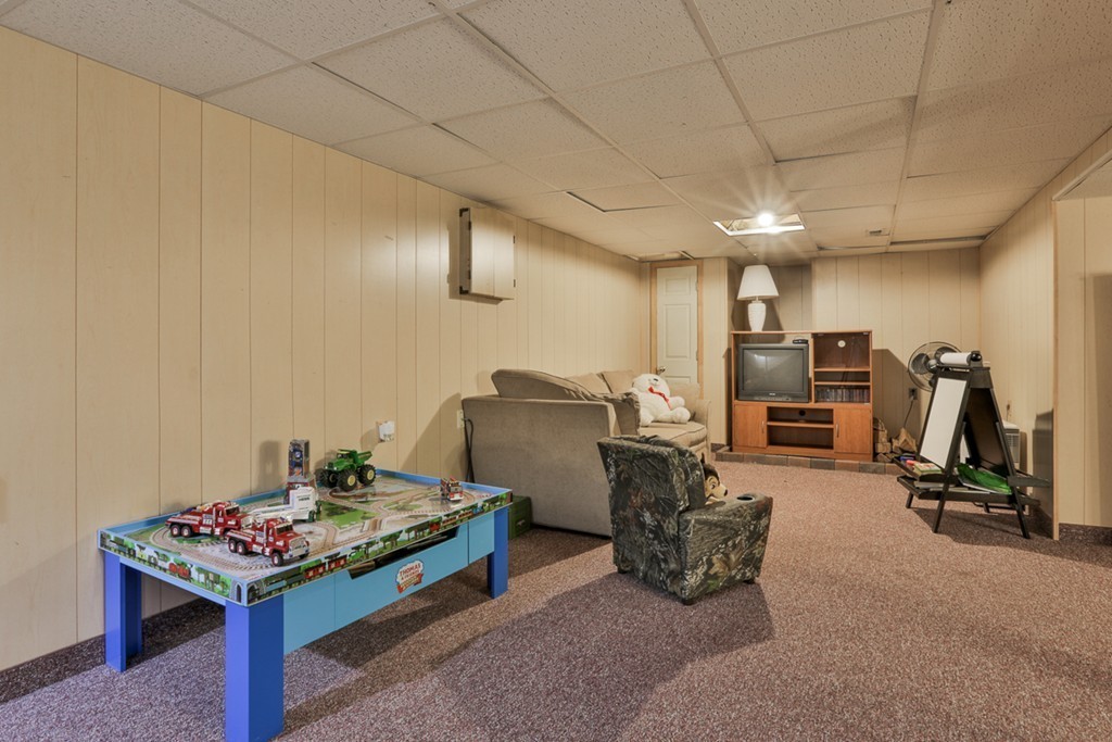 20 Patten Road Tewksbury, MA 01876 - Photo 26 of 29 a bed room with furniture and a table