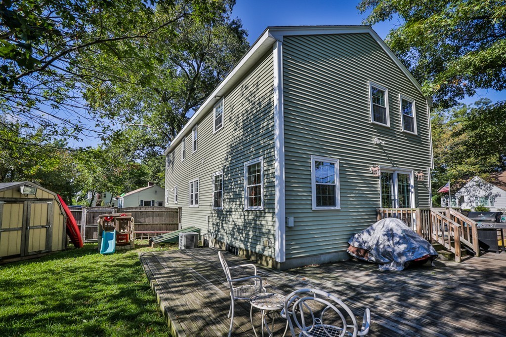 20 Patten Road Tewksbury, MA 01876 - Photo 28 of 29 a front view of a house with garden