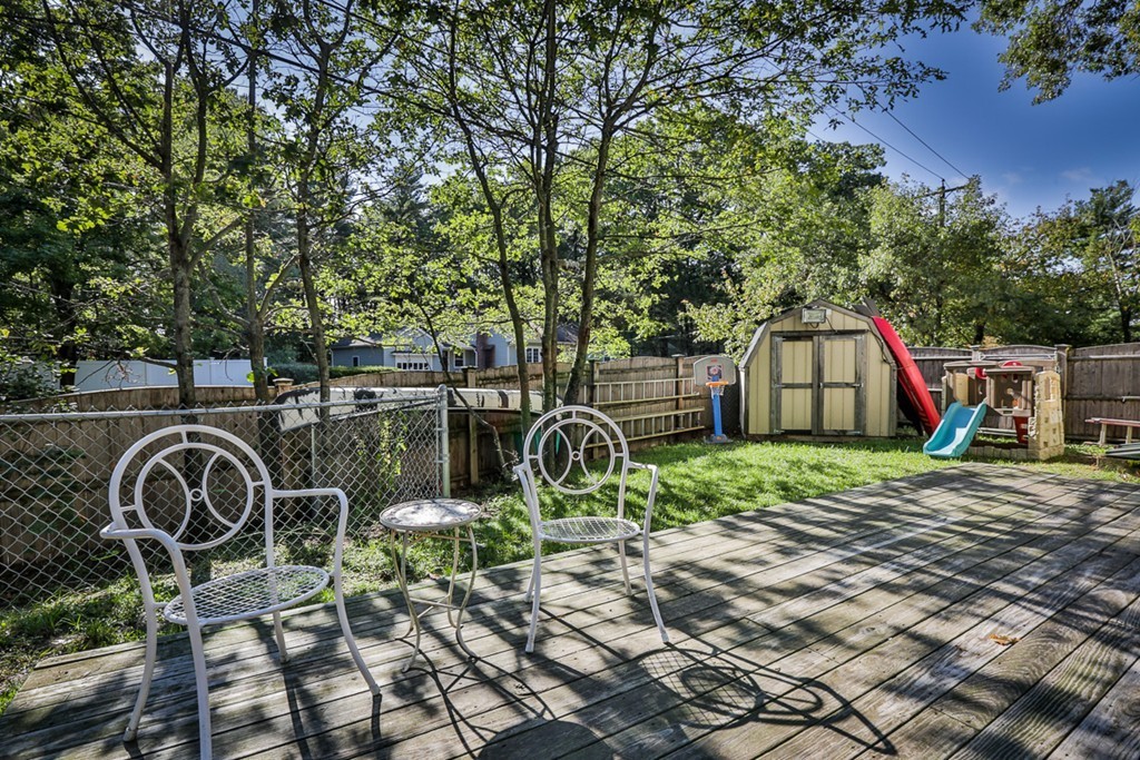 20 Patten Road Tewksbury, MA 01876 - Photo 29 of 29 a backyard of a house with barbeque oven table and chairs