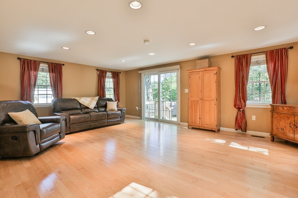 20 Patten Road Tewksbury, MA 01876 - Photo 9 of 29 a living room with furniture and large windows