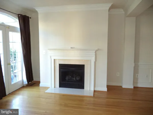 a living room with a fireplace
