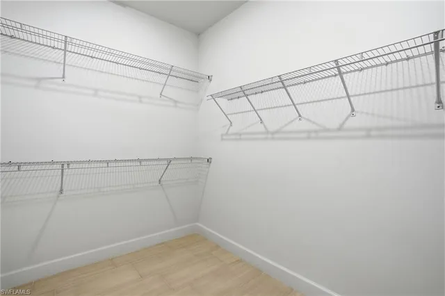 a view of a room with racks on the wall