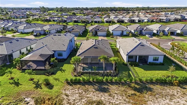 an aerial view of a house with a outdoor space