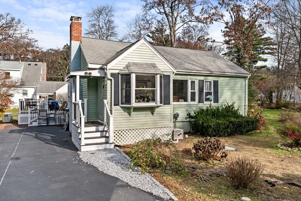 a front view of a house with a porch