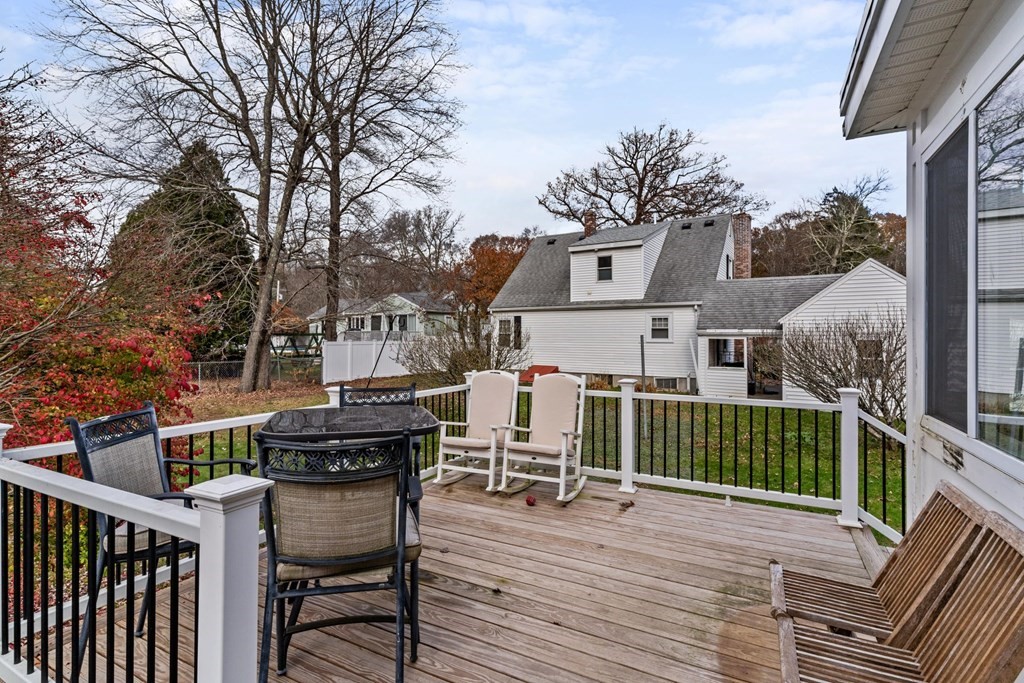 7 Meadowbrook Lane Ashland, MA 01721 - Photo 5 of 18 a view of a chairs and tables in the balcony