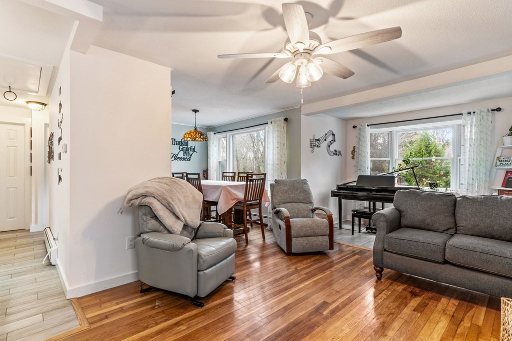 7 Meadowbrook Lane Ashland, MA 01721 - Photo 7 of 18 a living room with furniture and a large window