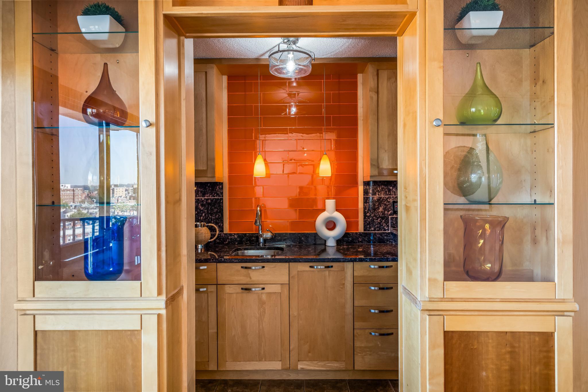 1816 New Hampshire Avenue Northwest, Unit 1009 Washington, DC 20009 - Photo 14 of 23 a bathroom with a sink and a mirror