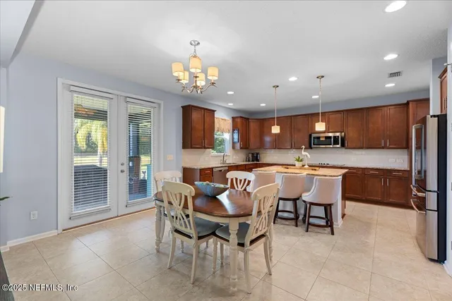 a view of a dining room with furniture