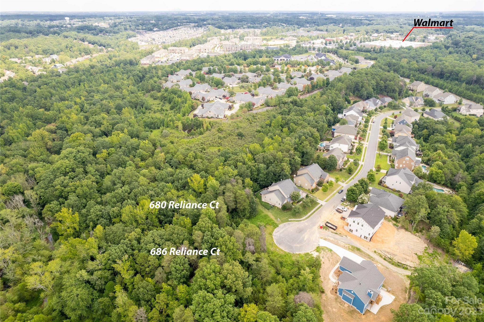 686 Reliance Court Tega Cay, SC 29708 - Photo 14 of 20 an aerial view of residential houses with outdoor space
