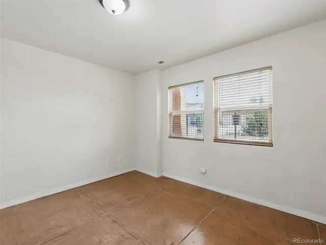 an empty room with a bathroom