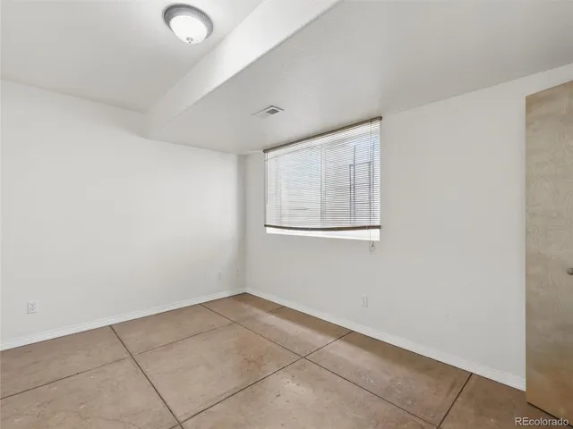 an aerial view of a house with outdoor space