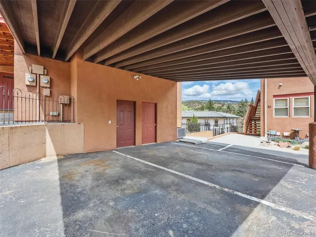 an aerial view of residential house and sandy dunes