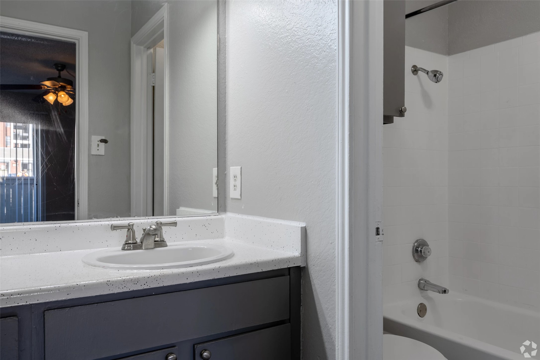 7610 Cameron Road, Unit 375 Austin, TX 78752 - Photo 11 of 42 a bathroom with a sink and a mirror
