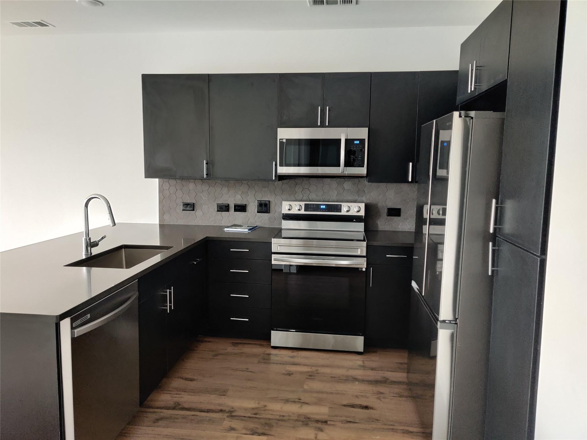 4801 Springdale Road, Unit 1102 Austin, TX 78723 - Photo 1 of 18 This well-appointed one-bedroom, one-bathroom unit offers comfortable living with a great mix of indoor and outdoor amenities. Includes one reserved parking spot, small fenced back yard, and a storage unit!